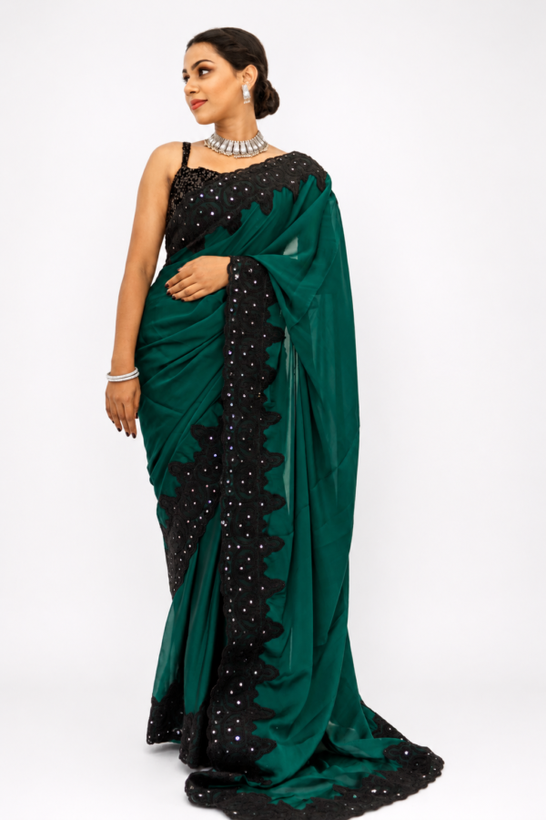 emerald green georgette saree
